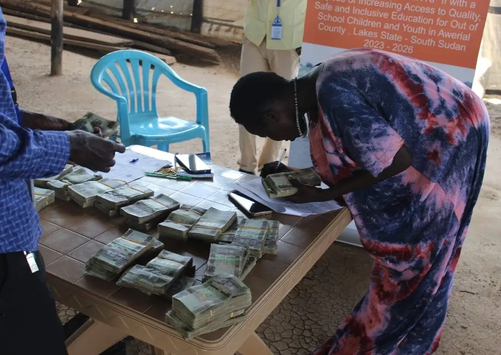 A participant receiving programme support